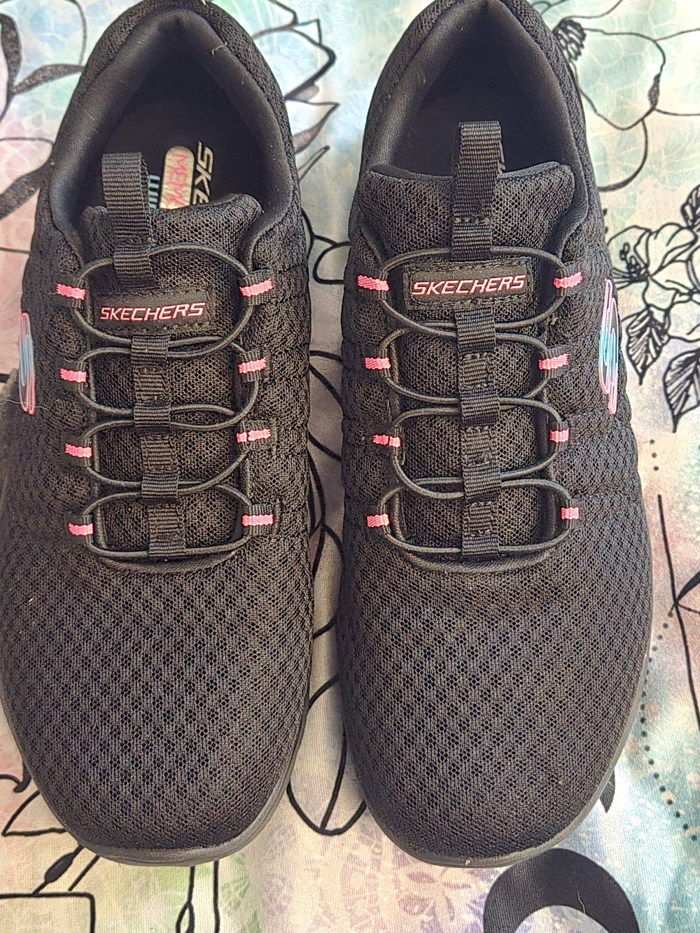 Skechers Women’s Black Slip-On Athletic Sneakers with Pink Accents